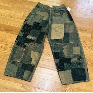 New! We the free SZ 28, Illusions relaxed fit jeans in indigo combo.